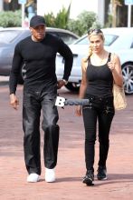 Dr. Dre spends some quality time with his wife Nicole Threat and has a little lunch date in Malibu today. The couple of 17 years wore matching all black today and cruised the streets in their cool three-wheel motorcycles.