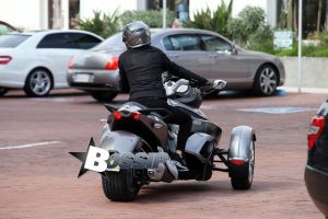 Dr. Dre spends some quality time with his wife Nicole Threat and has a little lunch date in Malibu today. The couple of 17 years wore matching all black today and cruised the streets in their cool three-wheel motorcycles.