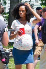 Yaya DaCosta shows off her baby bump on the set of "And So It Goes", a new film starring Michael Douglas and Diane Keaton. The "America's Next Top Model" star showed off her natural beauty in a fitted t-shirt, blue mini skirt, and keeping her hair big and curly.