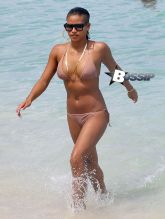 Cassie flaunts her hot bod in a skimpy flesh-toned bikini while enjoying a day at the beach in Miami,