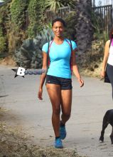 Actress Montana Fishburne, daughter of actor Laurence Fishburne, takes her dogs on playful hike through the Hollywood Hills on July 29, 2013.