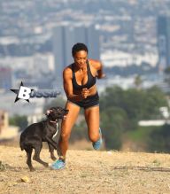 Actress Montana Fishburne, daughter of actor Laurence Fishburne, takes her dogs on playful hike through the Hollywood Hills on July 29, 2013.