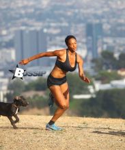 Actress Montana Fishburne, daughter of actor Laurence Fishburne, takes her dogs on playful hike through the Hollywood Hills on July 29, 2013.