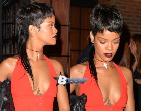 Rihanna seen out in a red dress