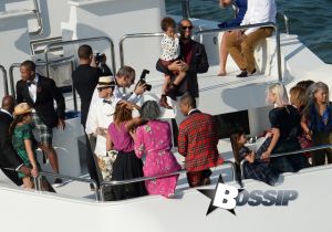 Pharrell Williams and new wife Helen Lasichanh have a family portrait session with Terry Richardson on a yacht called Never Say Never in Miami, Florida. In the evening the newlyweds will celebrate their nuptials at a swanky party at The Kampong National Tropical Botanical Garden in Coconut Grove.