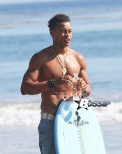 'Bolden!' actor Robert Ri'chard shows off his fit physique while catching a few waves in Malibu, California on November 4, 2013.