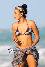 Reality star Angela Simmons shows off her curves as she spends the day with a friend at South Beach in Miami.