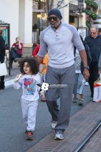 American former professional basketball player Cuttino Mobley and his son Mobley Jr. are seen doing a bit of last minute Christmas shopping.