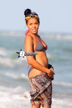 Reality star Angela Simmons shows off her curves as she spends the day with a friend at South Beach in Miami.