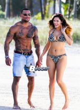 British model Kelly Brook and boyfriend David McIntosh show off their toned beach bodies as they spend the day at the Shore Club in Miami.