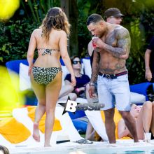 British model Kelly Brook and boyfriend David McIntosh show off their toned beach bodies as they spend the day at the Shore Club in Miami.