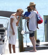 Charlize Theron touches down in Miami, Florida with her son Jackson to do a photo shoot on March 19, 2014.