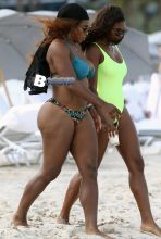 Serena Williams goes for a swim in the ocean with friends in Miami Beach. The tennis player went in the water with a female friend before relaxing on her sun lounger. After some fun in the sun and sand Selena went back inside her Miami hotel.
