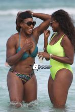 Serena Williams goes for a swim in the ocean with friends in Miami Beach. The tennis player went in the water with a female friend before relaxing on her sun lounger. After some fun in the sun and sand Selena went back inside her Miami hotel.