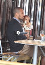Jesse Williams and his wife Aryn Drake Lee pictured having lunch with their baby daughter Sadie in the MeatPacking area in Downtown, Manhattan.