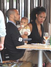 Jesse Williams and his wife Aryn Drake Lee pictured having lunch with their baby daughter Sadie in the MeatPacking area in Downtown, Manhattan.
