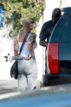 Amber Rose stops by a spa in Studio City with a male friend.