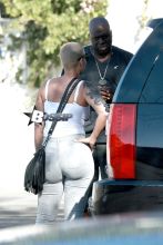 Amber Rose stops by a spa in Studio City with a male friend.