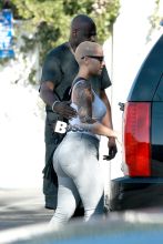 Amber Rose stops by a spa in Studio City with a male friend.