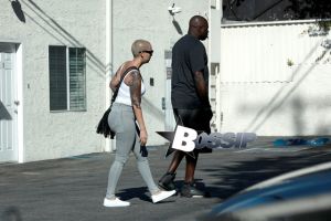Amber Rose stops by a spa in Studio City with a male friend.