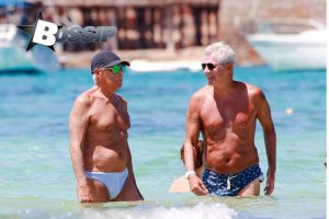 Giorgio Armani soaks up the sun during a Spanish escape in Ibiza, Spain. The Italian fashion designer hung out with Roberta Armani and her new boyfriend along with some other friends, as he enjoyed some time in the ocean.