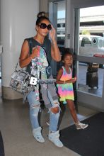 P Diddy ex Sarah Chapman and daughter Chance Combs arrive at LAX for an outgoing flight out of town.