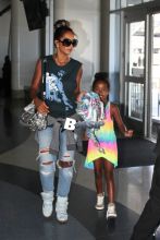 P Diddy ex Sarah Chapman and daughter Chance Combs arrive at LAX for an outgoing flight out of town.