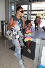 P Diddy ex Sarah Chapman and daughter Chance Combs arrive at LAX for an outgoing flight out of town.