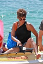 Halle Berry smiles ear-to-ear as she and her daughter, Nahla, get ready to go parasailing during their family vacation in Hawaii. Meanwhile, Halle's husband Olivier Martinez, stayed on shore with their son, Maceo.