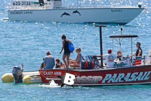 Halle Berry smiles ear-to-ear as she and her daughter, Nahla, get ready to go parasailing during their family vacation in Hawaii. Meanwhile, Halle's husband Olivier Martinez, stayed on shore with their son, Maceo.