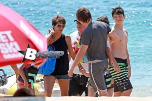 Halle Berry smiles ear-to-ear as she and her daughter, Nahla, get ready to go parasailing during their family vacation in Hawaii. Meanwhile, Halle's husband Olivier Martinez, stayed on shore with their son, Maceo.