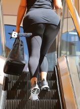 Kim Kardashian stops by Coffee Bean to get some caffeine in her system and then made her way to pilates class. The reality star accentuated her curves wearing a black camisole, showing off her cleavage, and paired it with black tights.