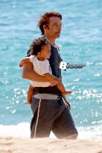 Halle Berry smiles ear-to-ear as she and her daughter, Nahla, get ready to go parasailing during their family vacation in Hawaii. Meanwhile, Halle's husband Olivier Martinez, stayed on shore with their son, Maceo.