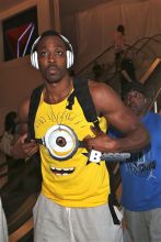 Dwight Howard, wearing a Ugg red slippers and a minion top, at Los Angeles International Airport (