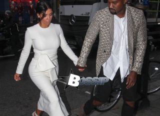 Kim Kardashian and Kanye West go out for a dinner date at Hakkasan Restaurant in Mayfair. West is spotted with an intricately shaved new hairstyle.