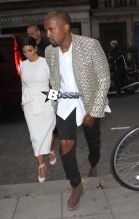 Kim Kardashian and Kanye West go out for a dinner date at Hakkasan Restaurant in Mayfair. West is spotted with an intricately shaved new hairstyle.
