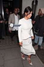 Kim Kardashian and Kanye West go out for a dinner date at Hakkasan Restaurant in Mayfair. West is spotted with an intricately shaved new hairstyle.