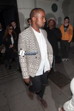 Kim Kardashian and Kanye West go out for a dinner date at Hakkasan Restaurant in Mayfair. West is spotted with an intricately shaved new hairstyle.