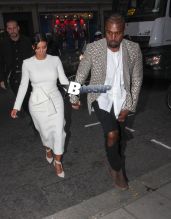 Kim Kardashian and Kanye West go out for a dinner date at Hakkasan Restaurant in Mayfair. West is spotted with an intricately shaved new hairstyle.