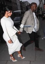 Kim Kardashian and Kanye West go out for a dinner date at Hakkasan Restaurant in Mayfair. West is spotted with an intricately shaved new hairstyle.