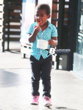 Couple Charlize Theron & Sean Penn stop to get some frozen yogurt with Charlize's son Jackson on November 19, 2014 in Hollywood, California. Charlize and Sean are enjoying some time off after working hard together filming their new project 'The Last Face' in South Africa. FameFlynet