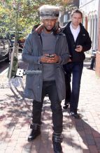 51581825 Singer Usher takes a morning stroll in Georgetown with his girlfriend Grace Miguel on November 11, 2014 in Washington, D.C. Usher may be trying to relive the excitment of finding a prize at the bottom of a cereal box. His new single "Clueless" will only be available to download off boxes of specially marked Honey Nut Cheerios at Walmart stores across the country. FameFlynet, Inc - Beverly Hills, CA, USA - +1 (818) 307-4813