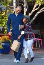 Nia Long and Ime Udoka share a laugh after lunch at Mauro's Cafe Fred Segal in West Hollywood. The happy couple returned to their car with big smiles and shared a laugh together after lunch at the LA eatery.
