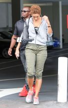Nicole Murphy and NBA player Jim Jackson were spotted together heading out of the Niketown store in Beverly Hills on Monday afternoon. The professional athlete and his model girlfriend, famous for her marriage to ex-husband Eddie Murphy, are rarely photographed together as they make a point to keep their relationship low profile. The couple looked like they were crazy in love as the left the store, smiling and laughing before making a low-key exit to their separate cars.