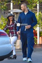 Nia Long and Ime Udoka share a laugh after lunch at Mauro's Cafe Fred Segal in West Hollywood. The happy couple returned to their car with big smiles and shared a laugh together after lunch at the LA eatery.