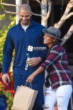 Nia Long and Ime Udoka share a laugh after lunch at Mauro's Cafe Fred Segal in West Hollywood. The happy couple returned to their car with big smiles and shared a laugh together after lunch at the LA eatery.