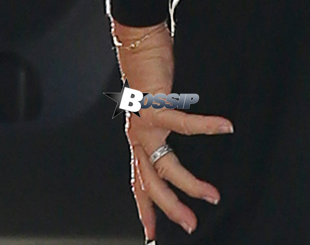 Bruce Jenner, sporting french manicured nails, pumps gas into his SUV at a gas station in Malibu, California. Lazic/Borisio/INF