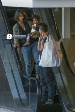 Halle Berry visits the chiropractor after suffering a tiny accident recently, when she swiped a yellow pole while trying to find a parking spot. The actress was accompanied by her husband, Olivier Martinez and their adorable son, Maceo. After Halle's finished up at the chiropractor's, the family-of-three went shopping at Michaels.