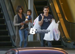 Halle Berry visits the chiropractor after suffering a tiny accident recently, when she swiped a yellow pole while trying to find a parking spot. The actress was accompanied by her husband, Olivier Martinez and their adorable son, Maceo. After Halle's finished up at the chiropractor's, the family-of-three went shopping at Michaels.