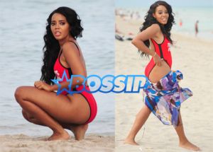 **USA ONLY** Miami, FL - Rapper Rev Run's daughter Angela, known for their family reality show 'Run's House,' is clearly all grown up! The 27-year-old curvy babe was spotted having fun with her girlfriends on a beach in Miami on Monday, wearing a 'Baywatch'-style red Wildfox one piece with the words "This Bod's For You" written across the front. The girls laughed and played in the sand, practicing their yoga backbends while snapping photos.